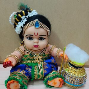Rubber dolls decorated as chubby Krishna