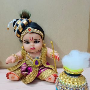Rubber dolls decorated as chubby Krishna