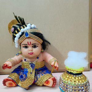Rubber dolls decorated as chubby Krishna