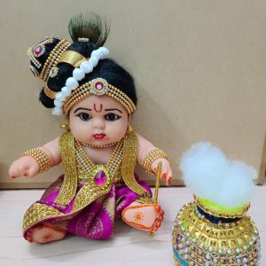 Rubber dolls decorated as chubby Krishna