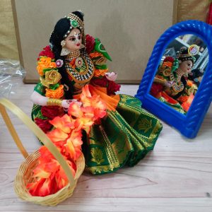 Andal making garland Doll
